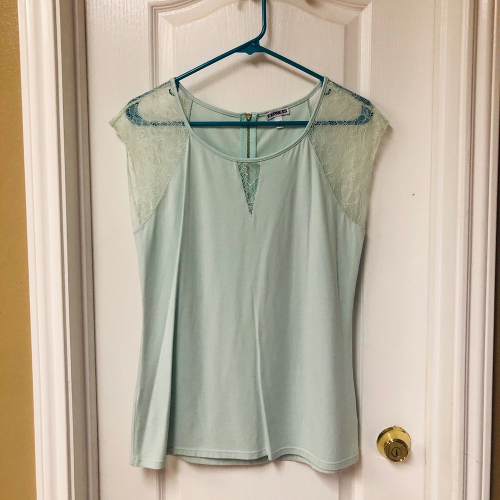 Express top with lace sleeve. NWOT